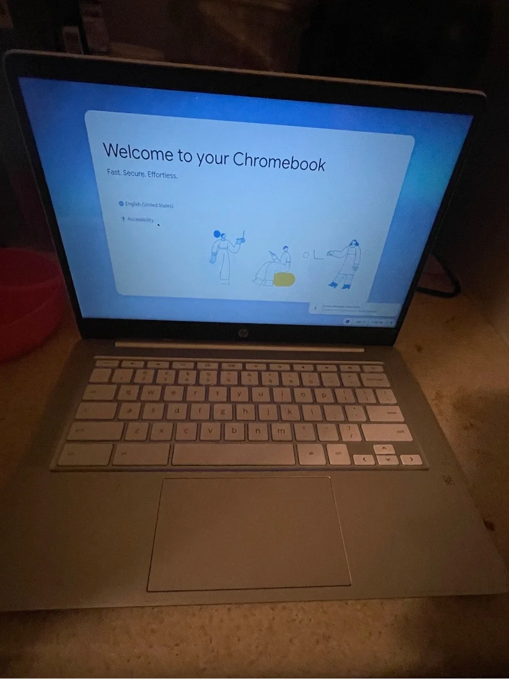 White and silver HP Chromebook with keyboard lights